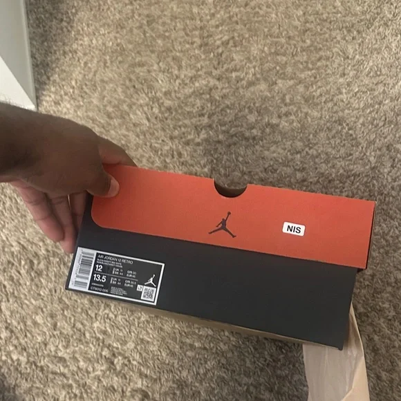 Jordan 12 Retro Black and White Sneakers - Picture 6 of 7